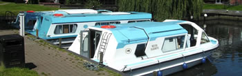 Two hire boats moored at Loddon on the Norfolk Broads